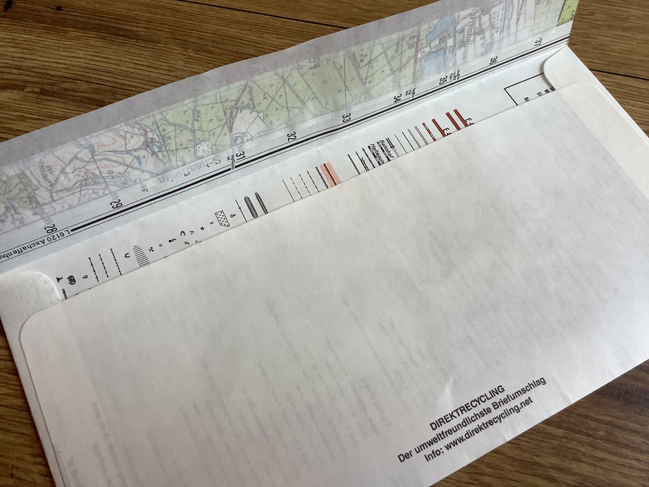 Briefumschläge DIN lang 100St. Direktrecycling (innen Landkarte)° - Polly Paper - Umweltfreundliche Schreibwaren