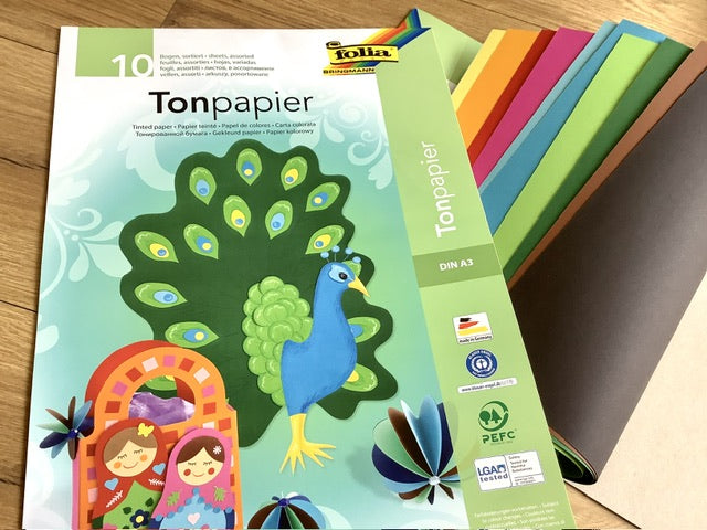 ein offener und ein geschlossener Block mit A3-Tonpapier in 10 Farben